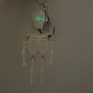 Skeleton hand sanitizer holder